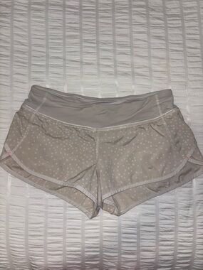 white / gray lululemon shorts
